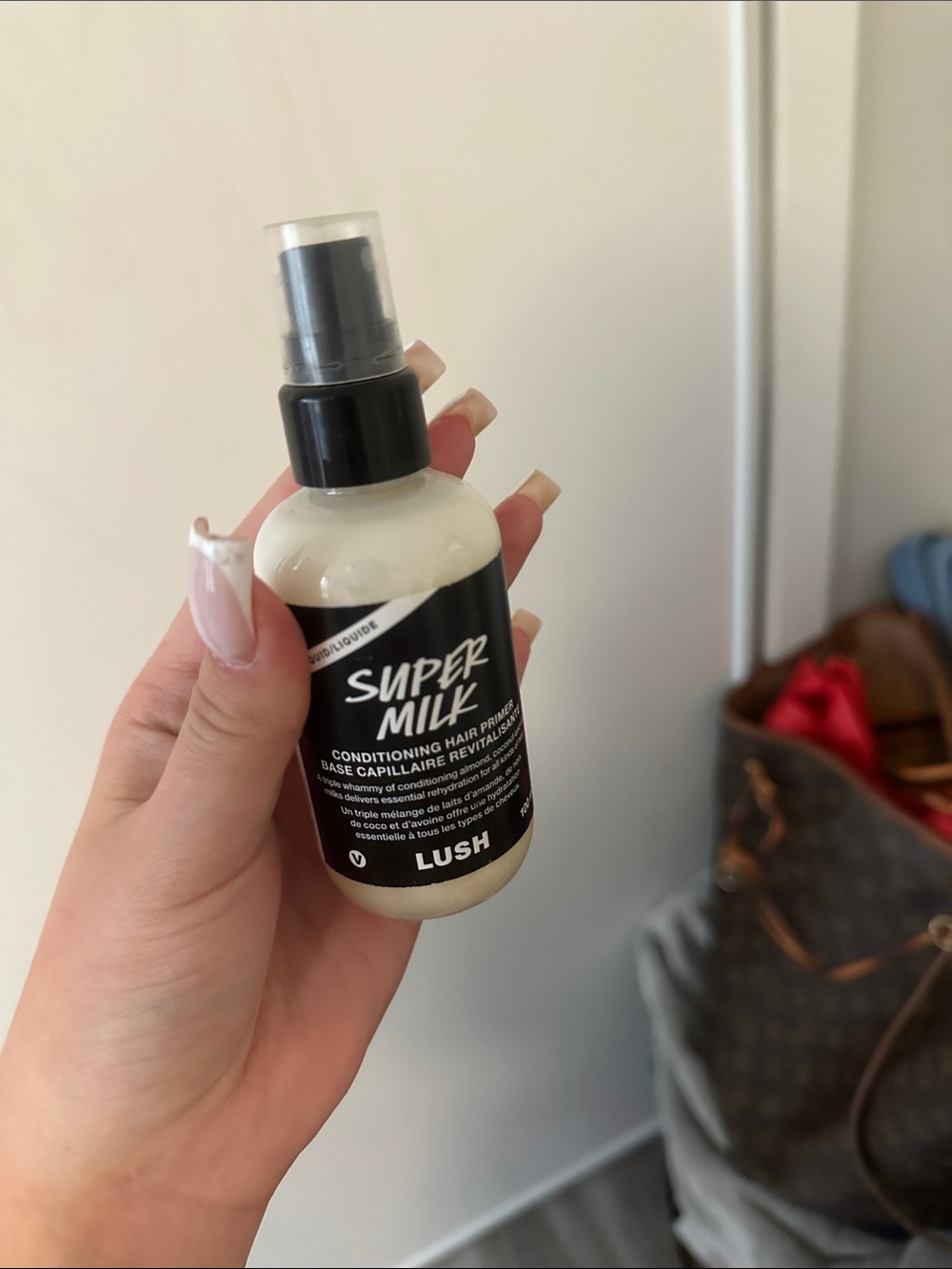 Lush Super Milk Conditioning Spray — Black & Cream